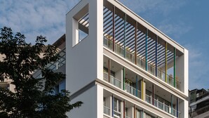 A modern multi-story building with large windows and balconies. - 1LI7E HOTEL (Taichung)