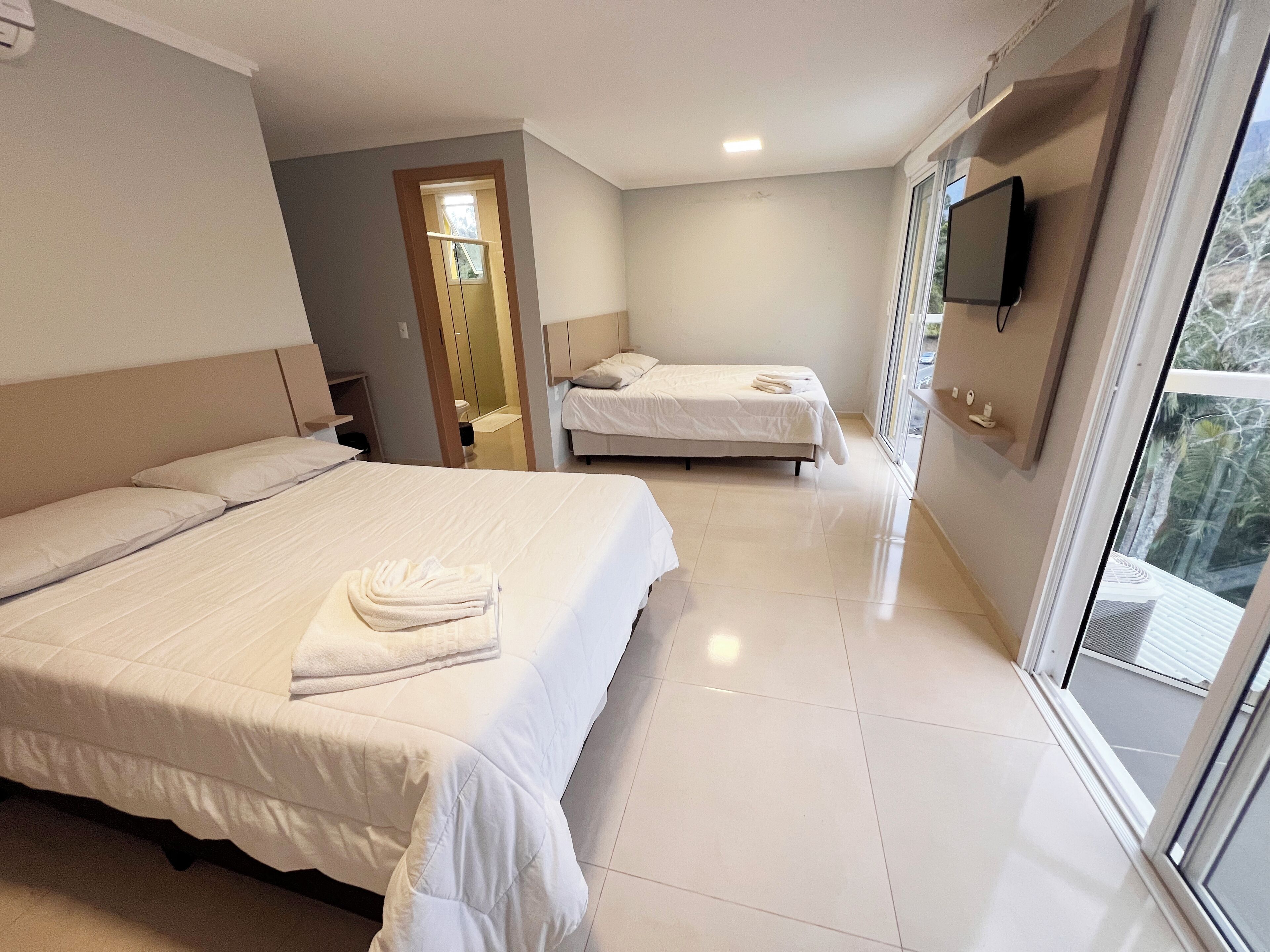 Family Quadruple Room | Hypo-allergenic bedding, desk, free WiFi, bed sheets