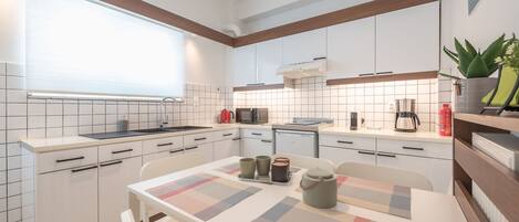 Family Quadruple Room | Private kitchen