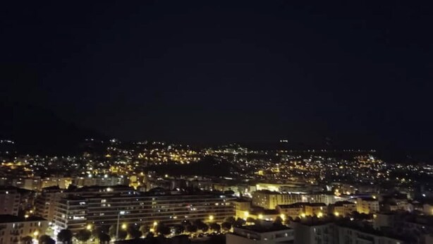 A nighttime cityscape with illuminated buildings and streets. - T2 a Proche Plage et Centre vu mer et Montagne (Nice)