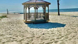 A beach gazebo with a clear view of the ocean. - Summer Vacay! 3Bed&3Bath-Walk 2 Beach, On-Site Pool, Golf, Casinos, Gated! (Gulfport)