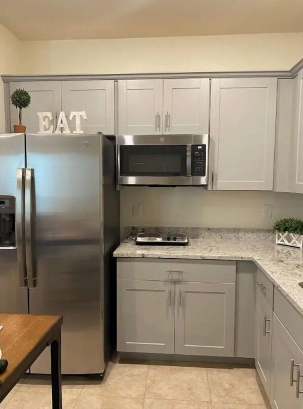 Fridge, microwave, dishwasher, coffee/tea maker