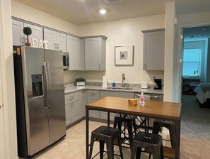 Fridge, microwave, dishwasher, coffee/tea maker