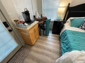 1 bedroom, desk, iron/ironing board, travel crib