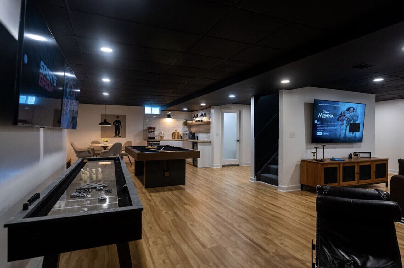 Lake house with a game room