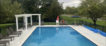 Lake house with a game room