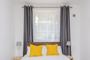 2 dormitorios, tabla de planchar con plancha, Internet y ropa de cama