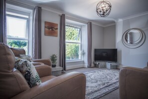 Casa urbana | Área de sala de estar | Televisión de pantalla plana 