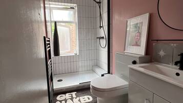 Shower, hair dryer, towels, soap