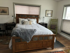 1 bedroom, desk, iron/ironing board, travel crib