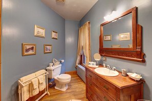 Combined shower/bathtub, hair dryer, towels, soap