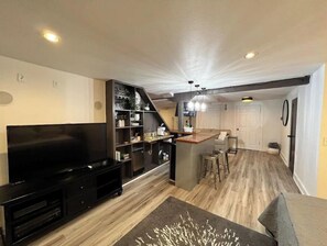 Smart TV, fireplace, books