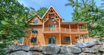 Luxury Log home steps from private beach in Meredith on Lake Winnipesaukee.