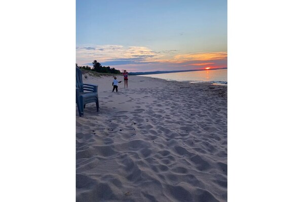 Walking along the beach, guests can enjoy the ocean views and peaceful atmosphere.