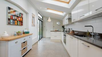 Fridge, microwave, dishwasher, coffee/tea maker