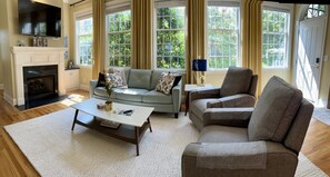 Smart TV, fireplace, books