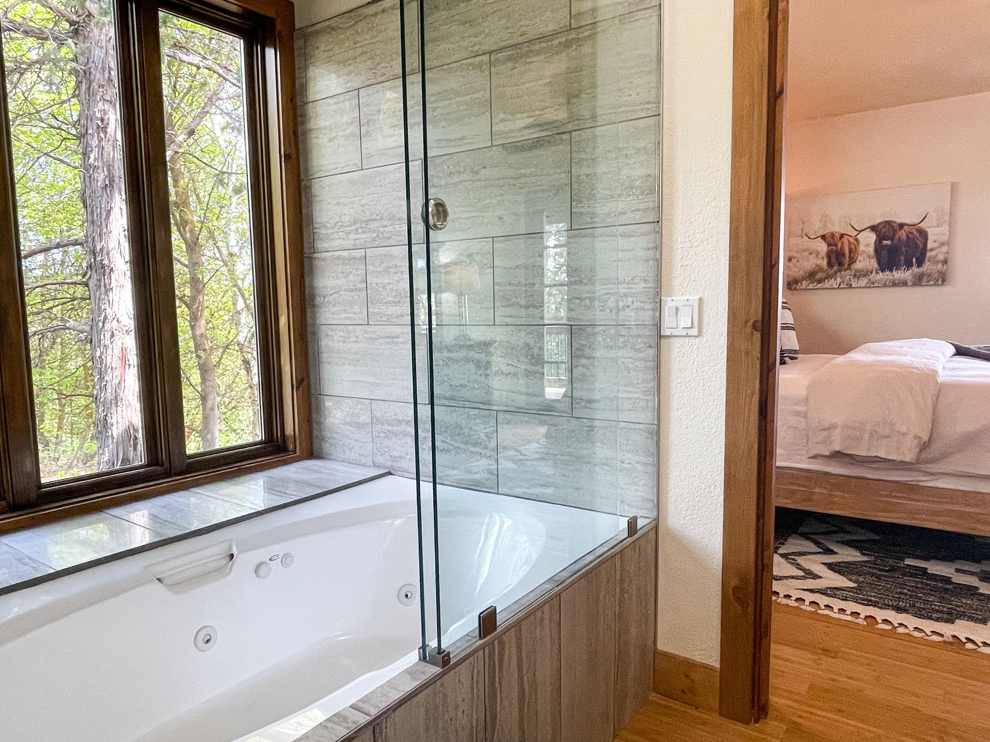 Combined shower/tub, hair dryer, towels, soap