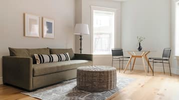 Superior Suite, 1 Queen Bed with Sofa bed | Living room | 40-inch flat-screen TV with digital channels, TV, streaming services