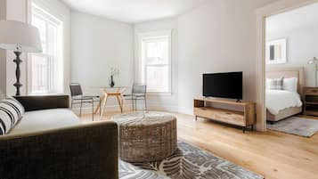 40-inch flat-screen TV with digital channels, TV, streaming services
