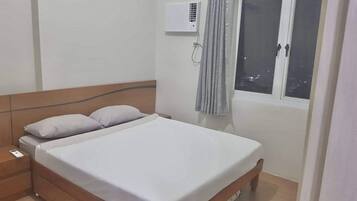 2 habitaciones, tabla de planchar con plancha y acceso a internet