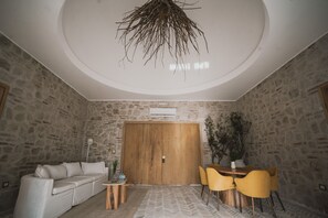 Deluxe Chozo | Living area - Chozos Resort (Ugarteche)