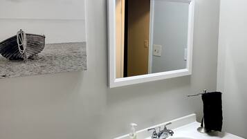 Combined shower/tub, towels, soap, toilet paper
