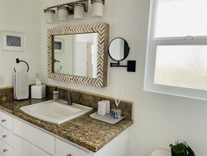 Combined shower/bathtub, hair dryer, towels, soap