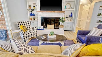 Télévision, cheminée, jeux vidéo, table de tennis de table