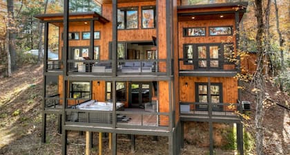 Modern 4BR Cabin w easy access, hot tub & a view!