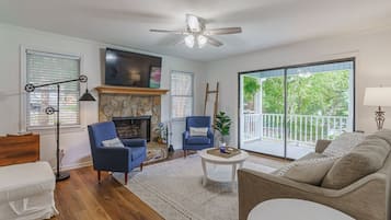 Smart TV, fireplace, table football, books