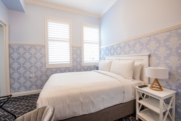 Desk, blackout curtains, free WiFi, bed sheets