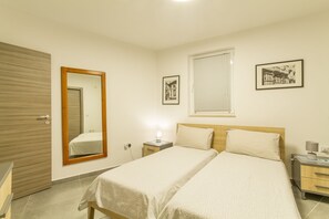 2 bedrooms, iron/ironing board, WiFi, bed sheets