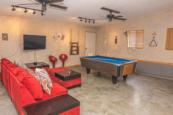 Game Room with Pool Table, TV, and Sitting Area