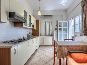 Fridge, microwave, cookware/dishes/utensils