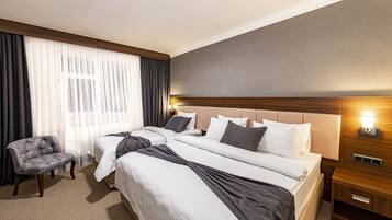 Premium bedding, minibar, in-room safe, laptop workspace