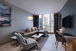Junior Suite, 1 King Bed | Living room | TV - AC Hotel by Marriott Monterrey Valle (San Pedro Garza García)