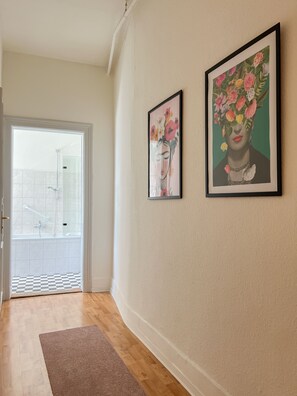 Combined shower/tub, hair dryer, towels, soap