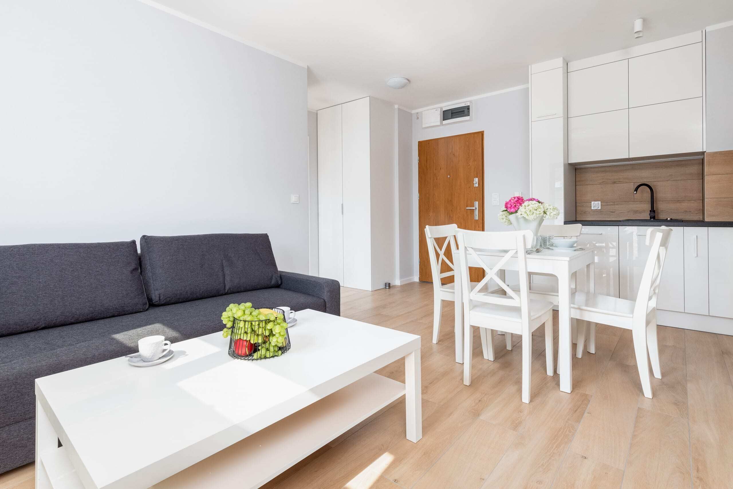 Relax in the stylish living room with a comfortable sofa and modern decor.