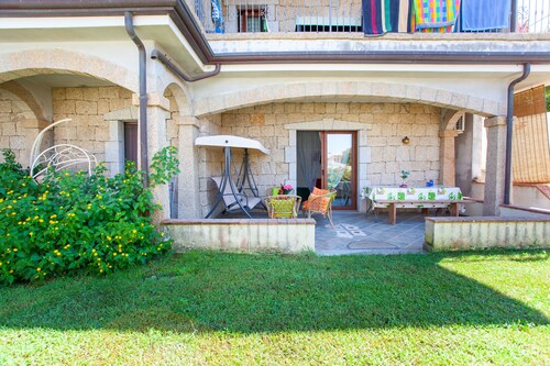 Maison de vacances da Marco" avec jardin et climatisation.