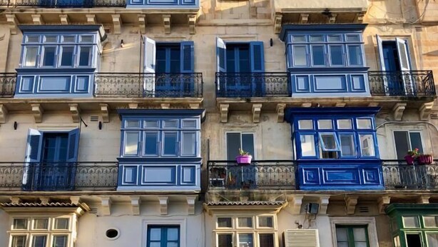 A multi-story building with balconies, windows, and doors. - Work & Travel - Valletta Apartments (Valletta)