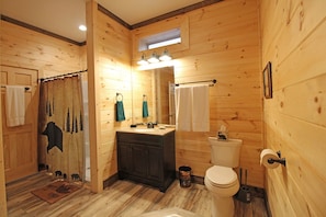 Bathtub, jetted bath, towels
