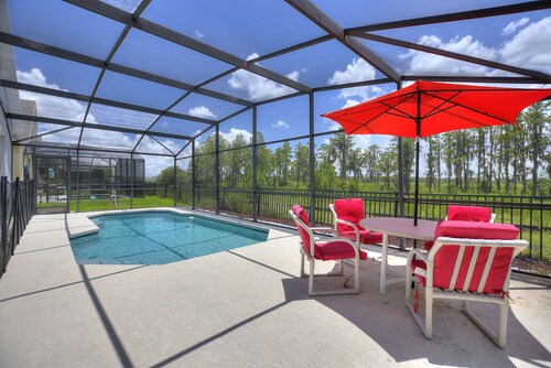 Pet friendly Pool Home with King suite 10 minutes to Disney World