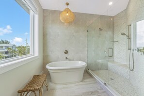 Bathtub, hair dryer, towels