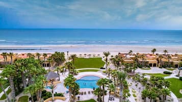 On the beach, sun-loungers, beach towels