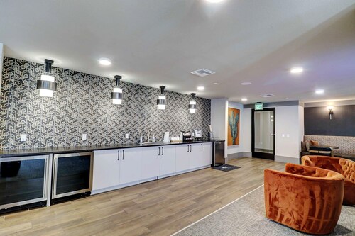 1BR King Bed • Kitchen • Work Desk • Parking