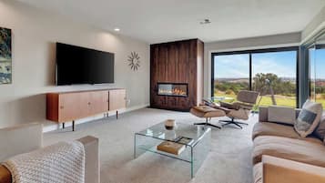 Smart TV, fireplace, video games, table football