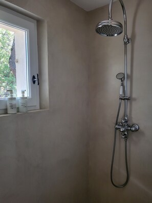 Shower, hair dryer, towels, soap