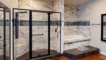 Bathtub, hair dryer, towels, soap