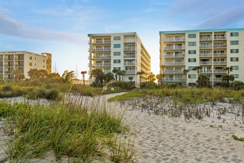 Comfortable, Coastal, Beachy Condo with Balcony, Pool, Tennis Court & Family Fun!