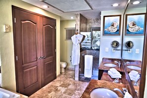 Shower, jetted tub, towels, soap